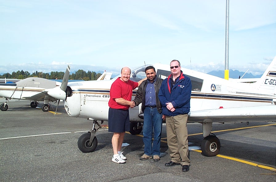Gobind Sandhanwalia with his Flight Instructor, David Parry, and Transport Canada Inspector Peter Cox, following the completion of Gobind's Instructor Rating on October 15, 2009.  Langley Flying School