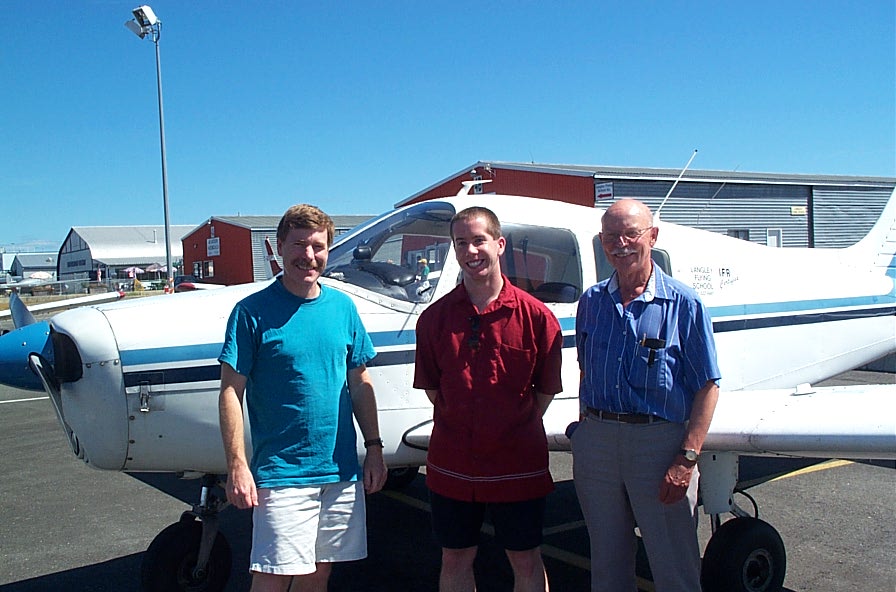 Jeffery Forseth with Flight Instructor Peter Waddington and Pilot Examiner Donn Richardson, following Jeff's Commercial Pilot Flight Test.  Langley Flying School.