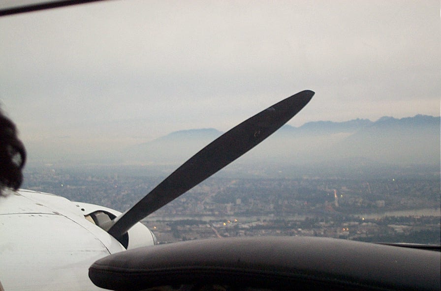Looking toward New Westminster, beyond Abinav Sonok's feather Propeller.  Langley Flying School.