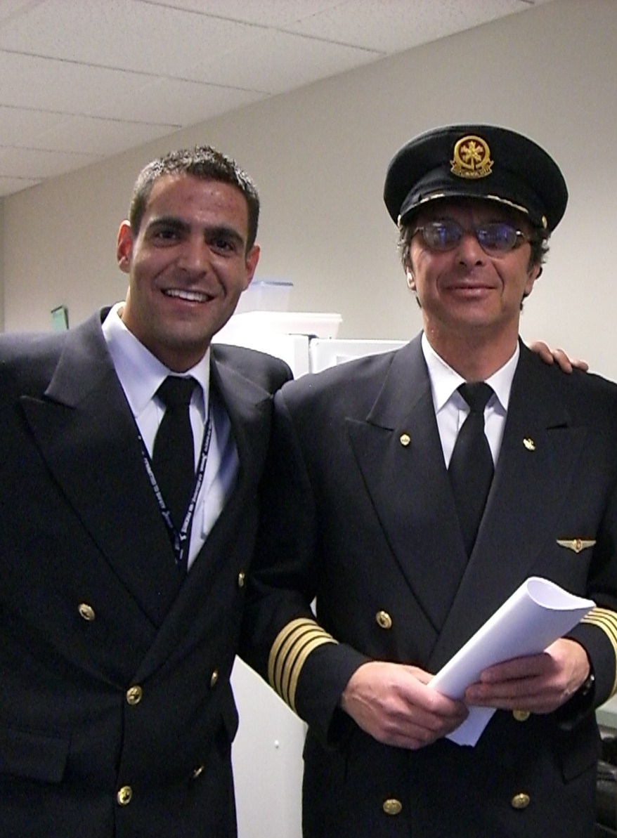 Photo of Feras Aboulhosn (left), Langley Flying School Graduate and CRJ 705 Pilot.