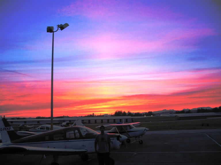 Rod Giesbrecht's photo of the Langley Flying School ramp at sunset.