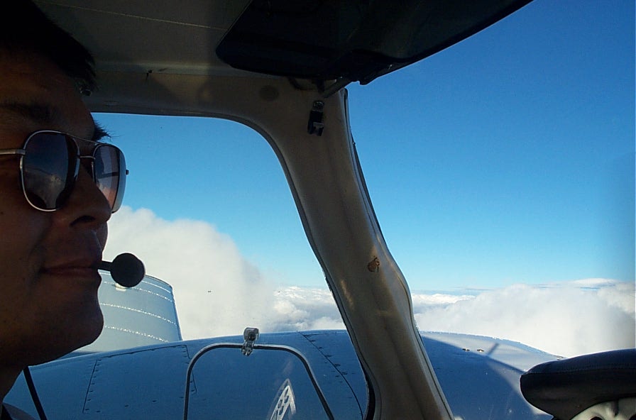 Pilot Sang Lee flying the Seneca of California.  Langley Flying School.