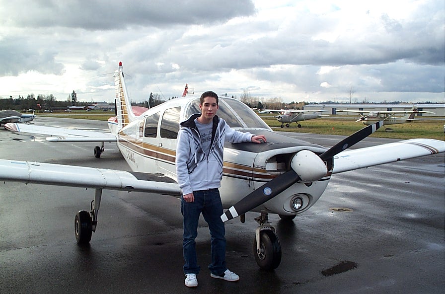 Alex Birch with Cherokee GUKG after completing his First Solo Flight on December 5, 2007.  Langley Flying School.
