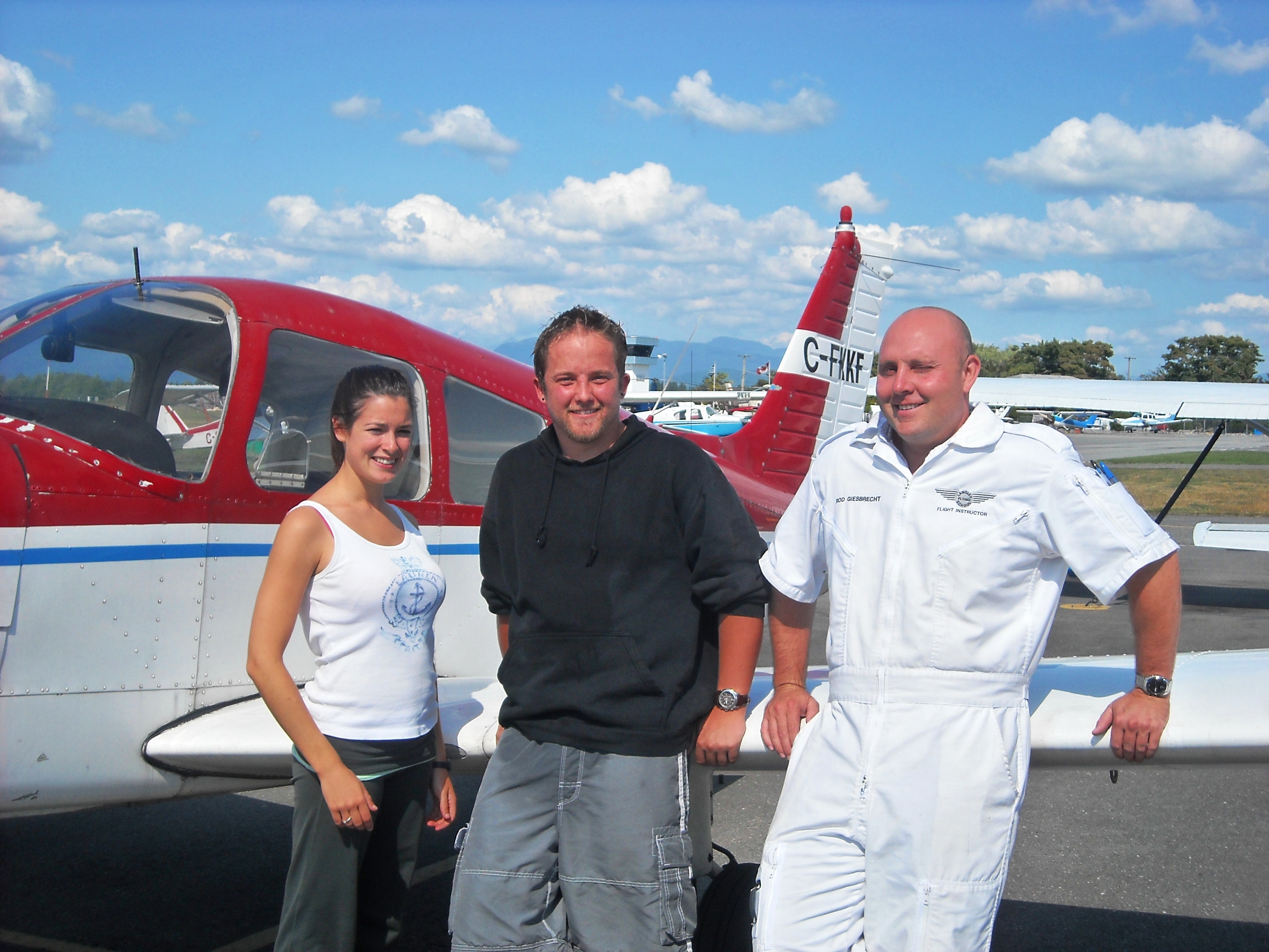 Naomi Jones and Rod Giesbrecht with Jason Nel.  Langley Flying School.