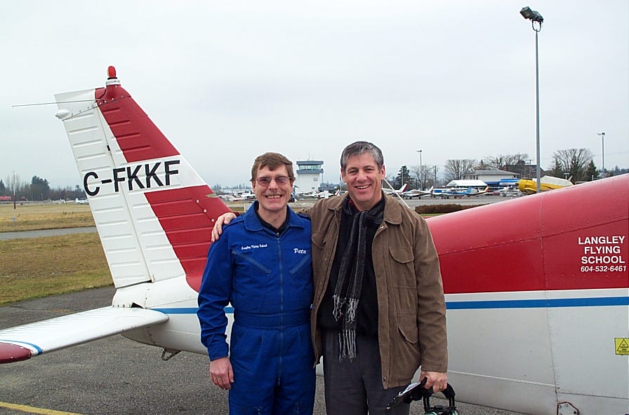 Joel Schacter with Flight Instructor Peter Waddington after the completion of Joel's First Solo Flight on January 17, 2008.  Langley Flying School.