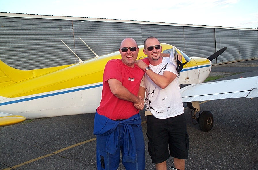 Matt Roesma with Flight Instructor Rod Giesbrecht after Matt's First Solo Flight in Cherokee GODP on August 23, 2008.  Langley Flying School.