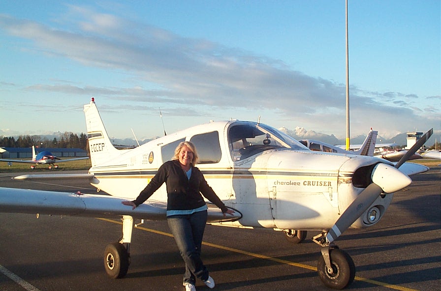 Sandy Wade with Cherokee GCEP after the completion of her First Solo Flight on March 8, 2010.  Congratulations also to Sandy's Flight Instructor, Naomi Jones.  Langley Flying School.