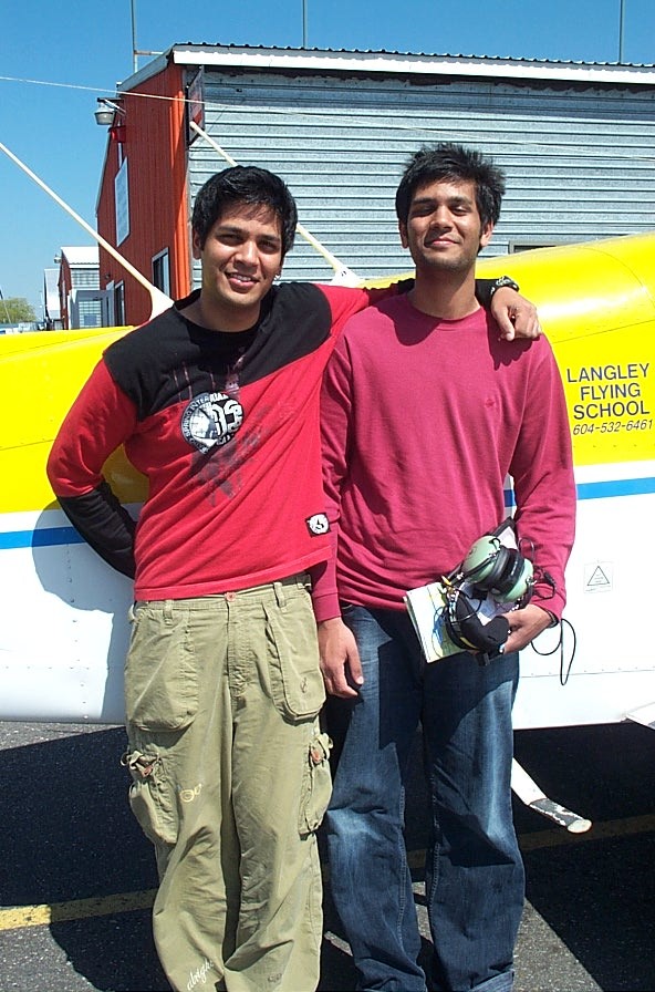 Suraj Canakapalli with his brother Sagar after the completion of Sagar's Private Pilot Flight Test.  Langley Flying School.