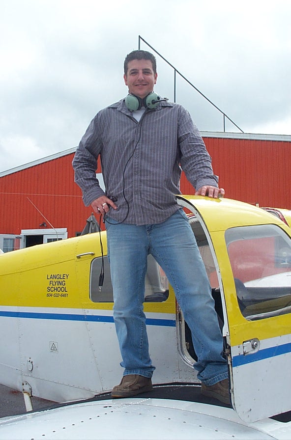 Tony McHale on the wing of Cherokee GODP after completing his First Solo Flight on October 1, 2007, Langley Flying School.