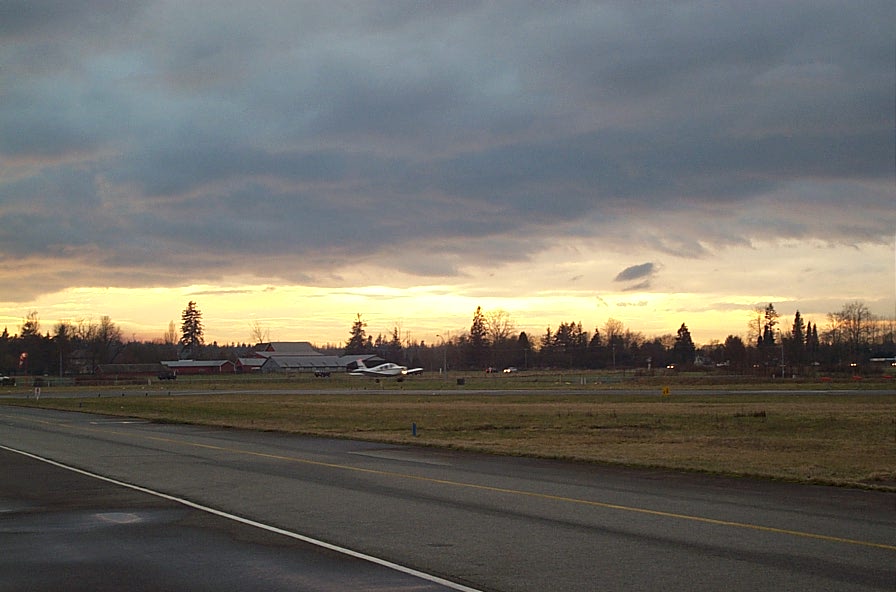 Langley Flying School Piper Cherokee departing Runway 01 at Sunset